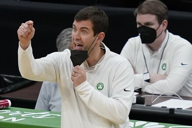 Boston Celtics head coach Brad Stevens instructs his players in the second half of an NBA basketball game against the Sacramento Kings, Friday, March 19, 2021, in Boston. (AP Photo/Elise Amendola)