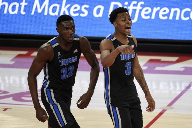 Memphis guard Landers Nolley II (3) reacts after making a three point basket as Moussa Cisse (32) watches during the first half of an NCAA college basketball game against Houston, Sunday, March 7, 2021, in Houston. (AP Photo/Eric Christian Smith)
