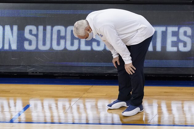 North Carolina head coach Roy Williams reacts to a play during the first half of an NCAA college basketball game against Florida State in the semifinal round of the Atlantic Coast Conference tournament in Greensboro, N.C., Friday, March 12, 2021. (AP Photo/Gerry Broome)