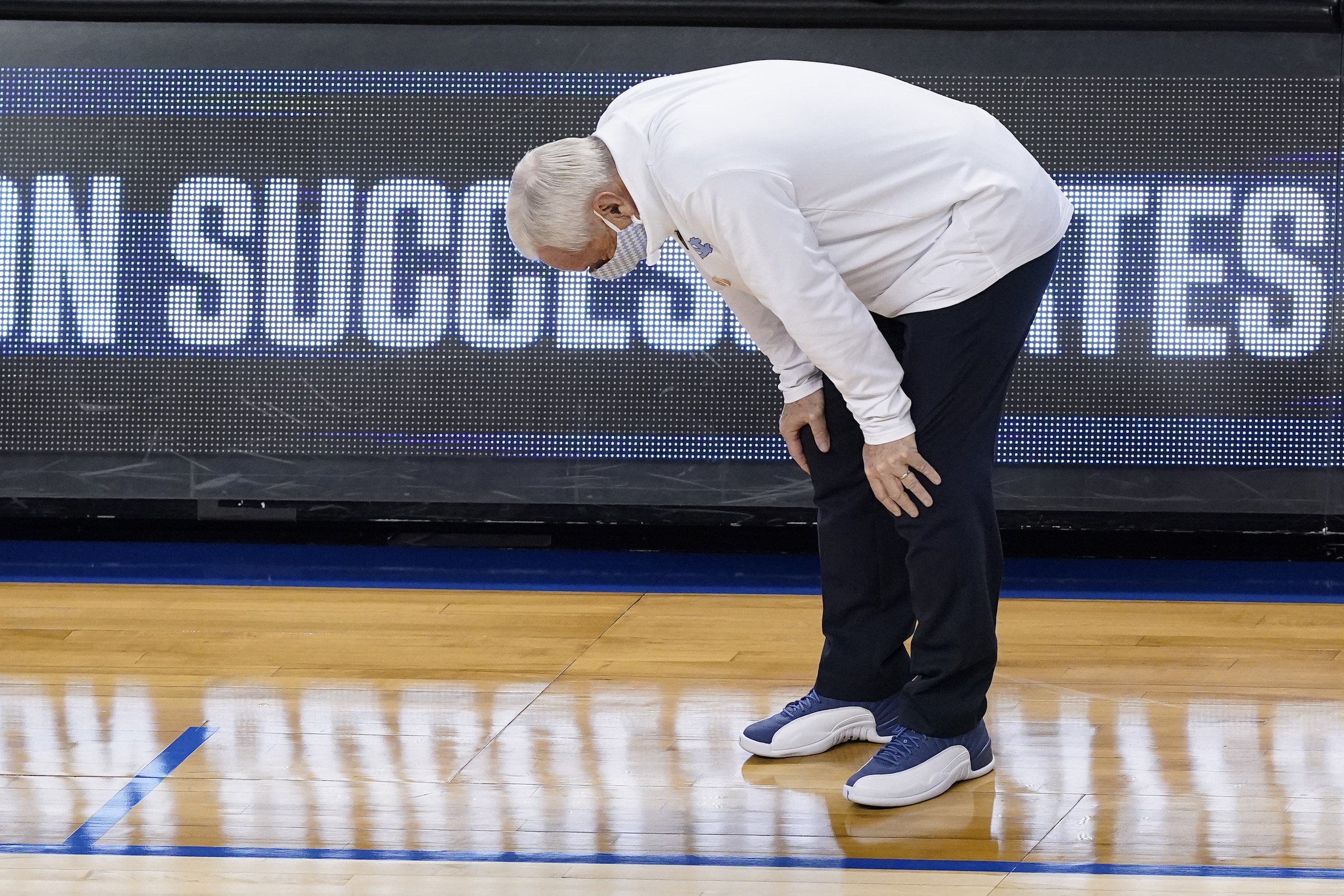 North Carolina head coach Roy Williams reacts to a play during the first half of an NCAA college basketball game against Florida State in the semifinal round of the Atlantic Coast Conference tournament in Greensboro, N.C., Friday, March 12, 2021. (AP Photo/Gerry Broome)