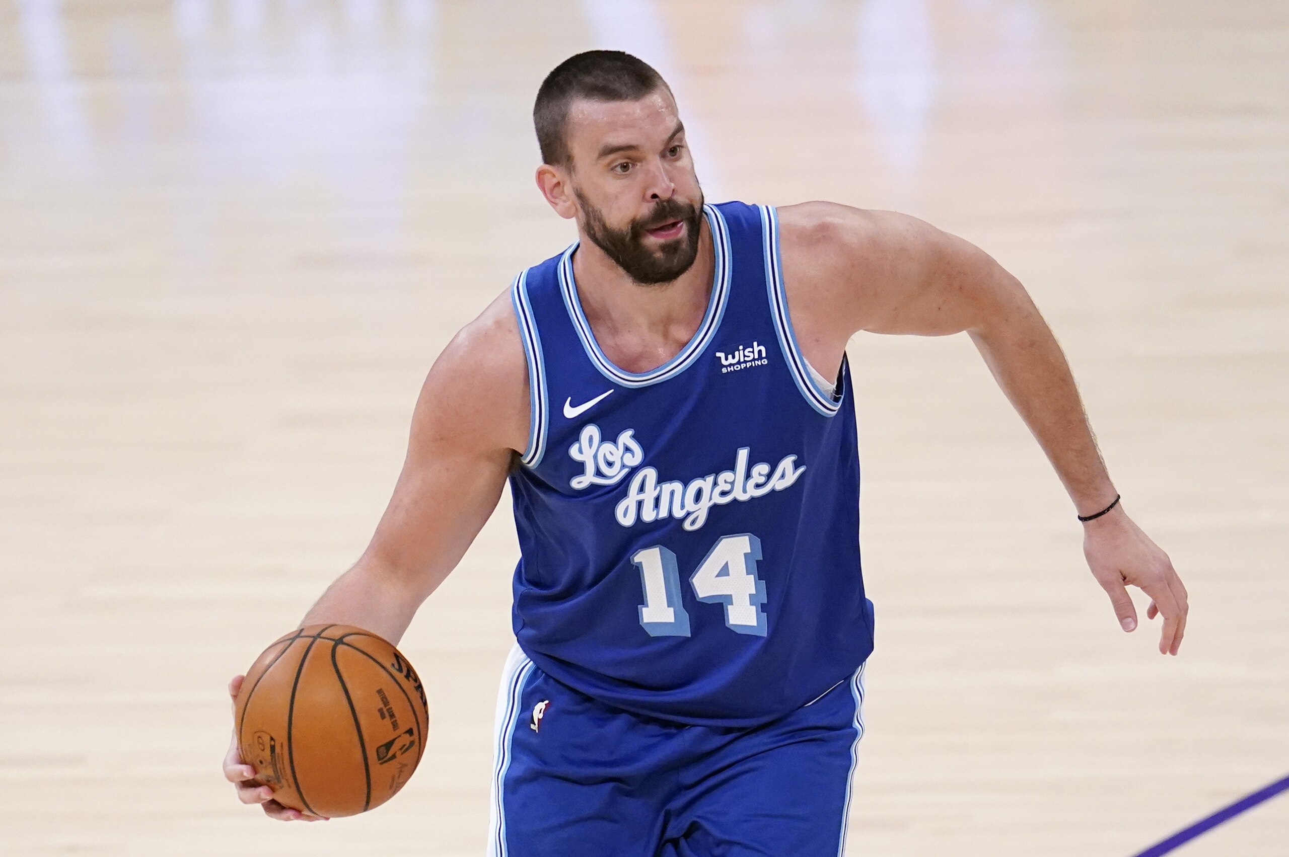 Los Angeles Lakers center Marc Gasol dribbles during an NBA basketball game against the Brooklyn Nets Thursday, Feb. 18, 2021, in Los Angeles. (AP Photo/Marcio Jose Sanchez)