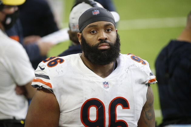 Chicago Bears defensive tackle Akiem Hicks stands on the sideline during the second half of an NFL football game against the Minnesota Vikings, Sunday, Dec. 20, 2020, in Minneapolis. (AP Photo/Bruce Kluckhohn)