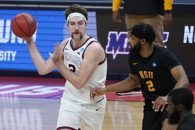 Gonzaga forward Drew Timme (2) looks to pass as Norfolk State guard Kashaun Hicks (2) defends during the first half of a men's college basketball game in the first round of the NCAA tournament at Bankers Life Fieldhouse in Indianapolis, Saturday, March 20, 2021. (AP Photo/Paul Sancya)