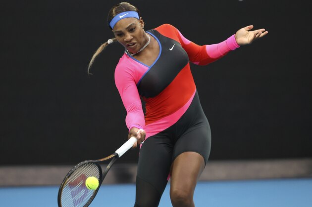 Romania's Simona Halep hits a forehand return to United States' Serena Williams during their match at the Australian Open Tennis championships in Melbourne, Australia, Tuesday, Feb. 16, 2021. (AP Photo/Hamish Blair)