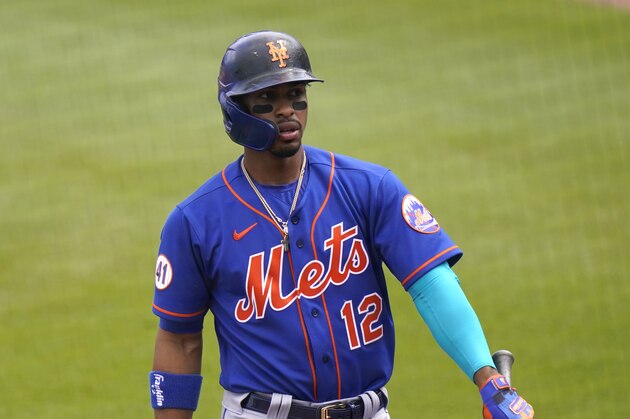 New York Mets' Francisco Lindor (12) walks on the field before a spring training baseball game against the Washington Nationals, Monday, March 8, 2021, in West Palm Beach, Fla. (AP Photo/Lynne Sladky) New York Mets' Francisco Lindor (12) walks on the field before a spring training baseball game against the Washington Nationals, Monday, March 8, 2021, in West Palm Beach, Fla. (AP Photo/Lynne Sladky)