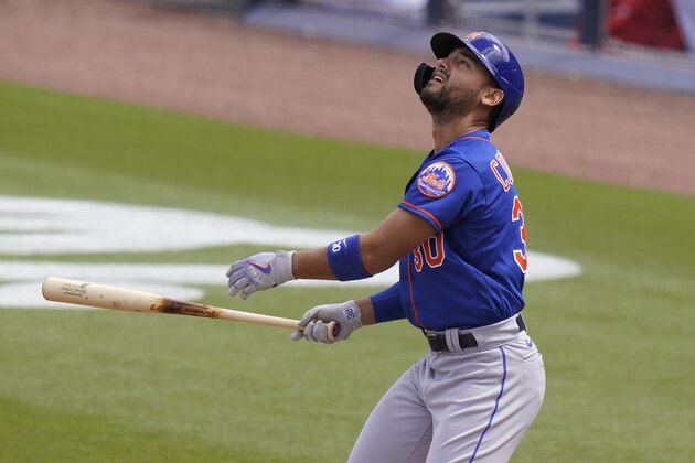 New York Mets' Michael Conforto bats during the first inning of a spring training baseball game against the Washington Nationals, Monday, March 8, 2021, in West Palm Beach, Fla. (AP Photo/Lynne Sladky)