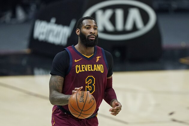 Cleveland Cavaliers' Andre Drummond drives in the second half of an NBA basketball game against the Milwaukee Bucks, Friday, Feb. 5, 2021, in Cleveland. (AP Photo/Tony Dejak)