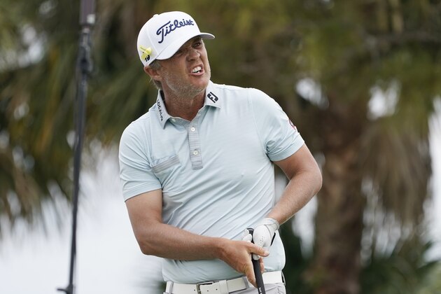 Matt Jones of Australia reacts to his shot on the fourth tee during the final round of the Honda Classic golf tournament, Sunday, March 21, 2021, in Palm Beach Gardens, Fla. (AP Photo/Marta Lavandier)