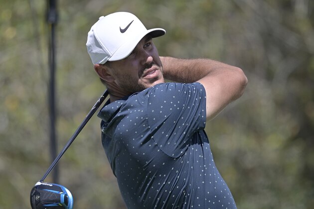 Brooks Koepka watches his tee shot on the first hole during the final round of the Workday Championship golf tournament Sunday, Feb. 28, 2021, in Bradenton, Fla. (AP Photo/Phelan M. Ebenhack)