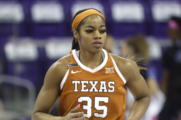 Texas forward Charli Collier (35) runs the court against TCU during the first half of an NCAA college basketball game, Sunday, March 7, 2021, in Fort Worth, Texas. (AP Photo/Ron Jenkins)