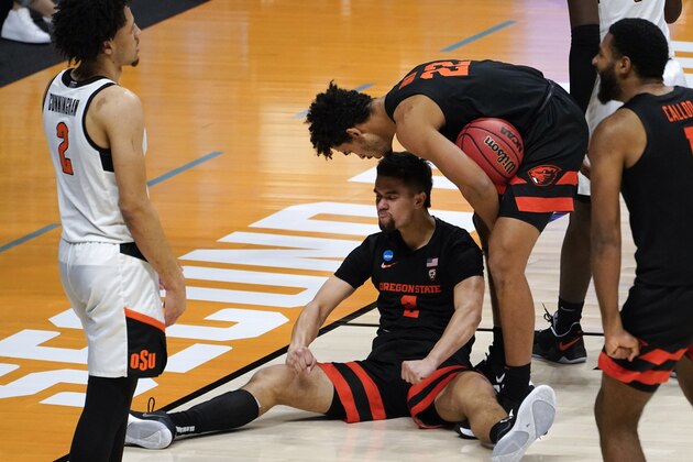Oregon State guard Jarod Lucas (2) reacts to being fouled on a layup against Oklahoma State during the first half of a men's college basketball game in the second round of the NCAA tournament at Hinkle Fieldhouse in Indianapolis, Sunday, March 21, 2021. (AP Photo/Paul Sancya)