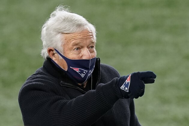 New England Patriots owner Robert Kraft points to special teams captain Matthew Slater before an NFL football game against the Buffalo Bills, Monday, Dec. 28, 2020, in Foxborough, Mass. (AP Photo/Elise Amendola)