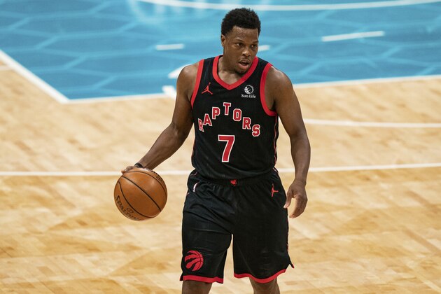 Toronto Raptors guard Kyle Lowry (7) brings the ball up court against the Charlotte Hornets during the second half of an NBA basketball game in Charlotte, N.C., Saturday, March 13, 2021. (AP Photo/Jacob Kupferman)