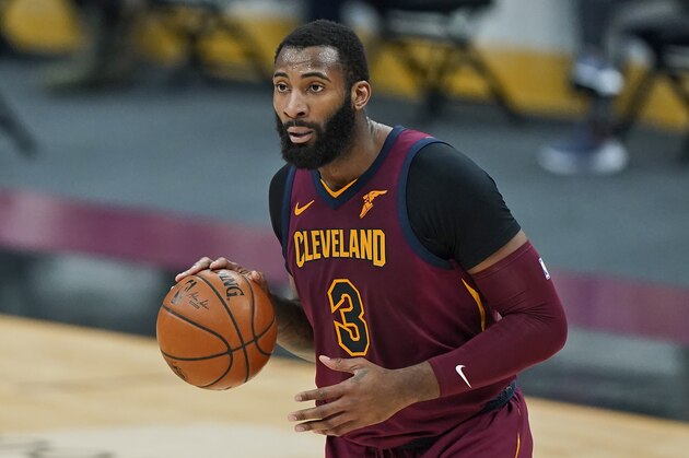 Cleveland Cavaliers' Andre Drummond drives the second half of an NBA basketball game against the Milwaukee Bucks, Friday, Feb. 5, 2021, in Cleveland. (AP Photo/Tony Dejak)
