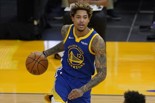 Golden State Warriors guard Kelly Oubre Jr. (12) against the Charlotte Hornets during an NBA basketball game in San Francisco, Friday, Feb. 26, 2021. (AP Photo/Jeff Chiu)