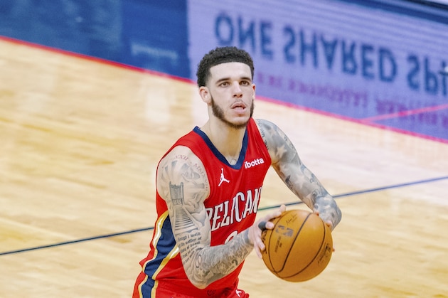 New Orleans Pelicans guard Lonzo Ball (2) dribbles in the first half of an NBA basketball game in New Orleans, Thursday, March 11, 2021. (AP Photo/Matthew Hinton)