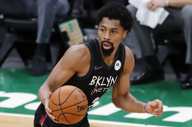 Brooklyn Nets' Spencer Dinwiddie plays against the Boston Celtics during the first half of an NBA basketball game, Friday, Dec. 25, 2020, in Boston. (AP Photo/Michael Dwyer)