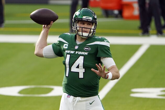 New York Jets quarterback Sam Darnold (14) throws against the Los Angeles Rams during the first half of an NFL football game Sunday, Dec. 20, 2020, in Inglewood, Calif. (AP Photo/Jae C. Hong)