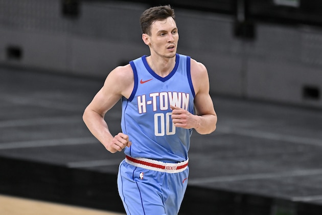 Houston Rockets' Rodions Kurucs runs up the court during the second half of an NBA basketball game against the San Antonio Spurs, Saturday, Jan. 16, 2021, in San Antonio. San Antonio won 103-91. (AP Photo/Darren Abate)