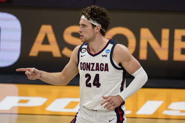 Gonzaga forward Corey Kispert (24) celebrates after a basket against Oklahoma in the second half of a second-round game in the NCAA men's college basketball tournament at Hinkle Fieldhouse in Indianapolis, Monday, March 22, 2021. (AP Photo/Michael Conroy)