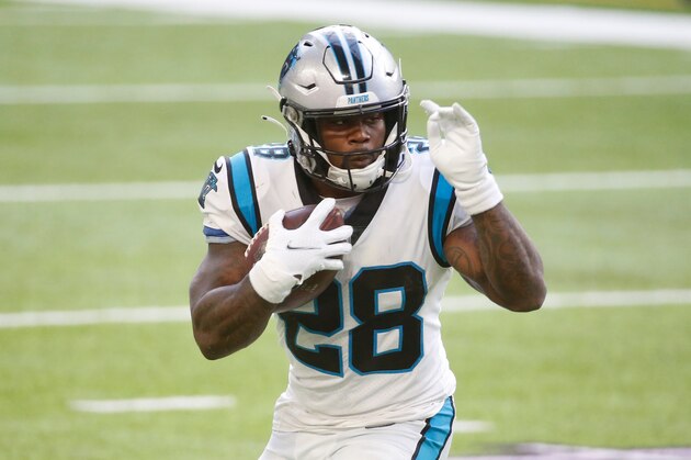 Carolina Panthers running back Mike Davis carries the ball up field during an NFL football game against the Minnesota Vikings, Sunday, Nov. 29, 2020, in Minneapolis. (AP Photo/Bruce Kluckhohn)