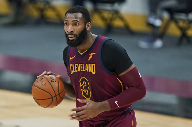 Cleveland Cavaliers' Andre Drummond drives the second half of an NBA basketball game against the Milwaukee Bucks, Friday, Feb. 5, 2021, in Cleveland. (AP Photo/Tony Dejak)