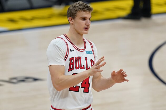Chicago Bulls forward Lauri Markkanen (24) in the first half of an NBA basketball game Friday, March 19, 2021, in Denver. (AP Photo/David Zalubowski)