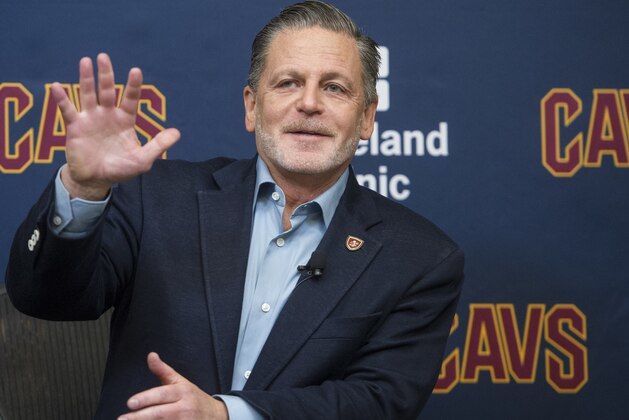 Cleveland Cavaliers chairman Dan Gilbert answers questions about Cavalier's Kyrie Irving's demand to be traded during an NBA basketball news conference at the team's training facility in Independence, Ohio, Wednesday, July 26, 2017. (AP Photo/Phil Long)