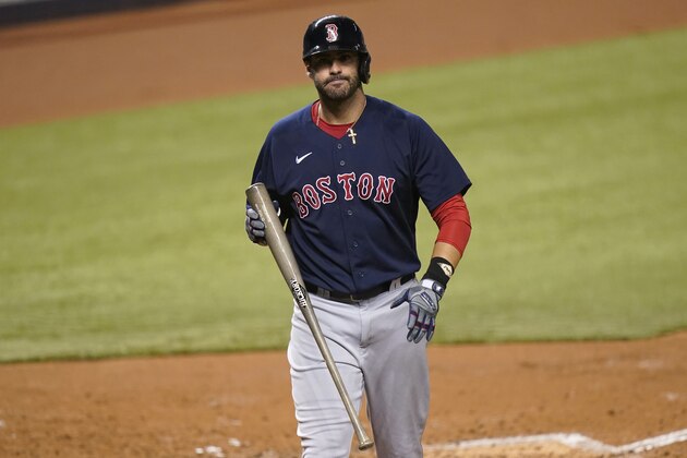 Boston Red Sox's J.D. Martinez reacts after striking out during the fourth inning of a baseball game against the Miami Marlins, Tuesday, Sept. 15, 2020, in Miami. (AP Photo/Lynne Sladky)