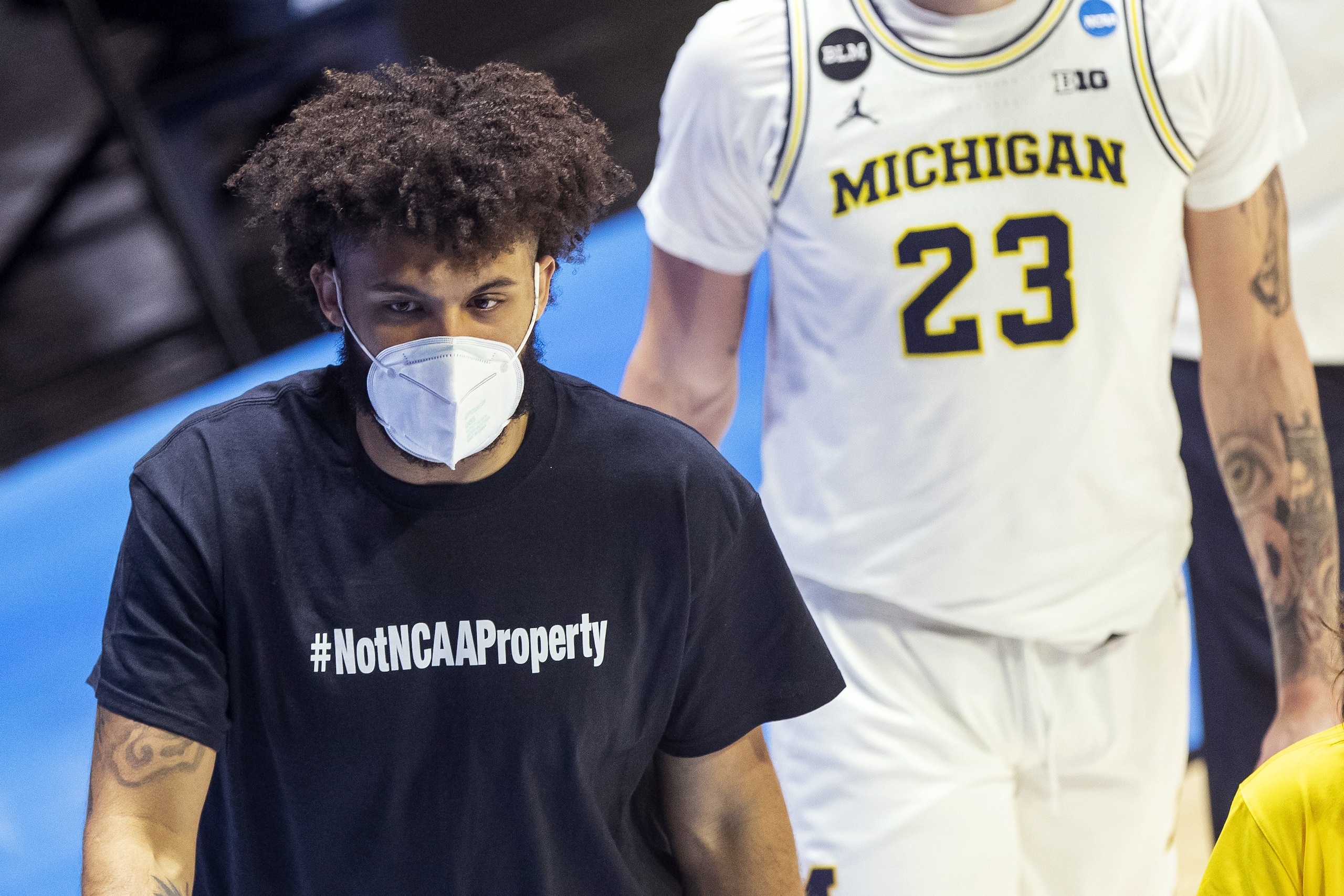 Michigan's Isaiah Livers wears a T-shirt that reads