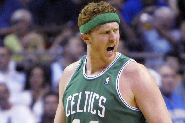 Boston Celtics center Brian Scalabrine argues with an official after being called for a foul during the first half of a second-round NBA playoff basketball game against the Orlando Magic in Orlando, Fla., Sunday, May 10, 2009. (AP Photo/Phelan M. Ebenhack)