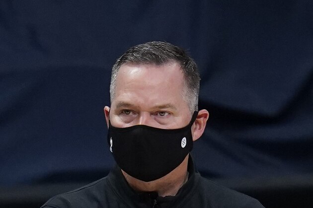 Denver Nuggets head coach Michael Malone looks on during the third quarter of an NBA basketball game against the Dallas Mavericks Thursday, Jan. 7, 2021, in Denver. (AP Photo/Jack Dempsey)