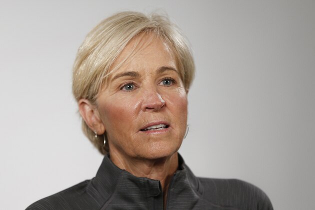 FILE - In this Oct. 3, 2019, file photo, Georgia Tech coach Nell Fortner answers a question during the Atlantic Coast Conference women's NCAA college basketball media day in Charlotte, N.C. The Bobcats went into Columbus on Sunday, Nov. 17, 2019 and beat Ohio State 74-68 for the first time in school history. The Yellow Jackets (3-0) have only won seven of the 42 meetings between the schools. (AP Photo/Nell Redmond, File)