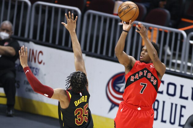 Toronto Raptors' Kyle Lowry (7) shoots over Cleveland Cavaliers' Isaac Okor (35) in the first half of an NBA basketball game, Sunday, March 21, 2021, in Cleveland. (AP Photo/Ron Schwane)