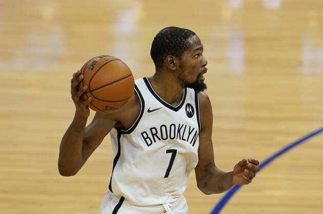 Brooklyn Nets forward Kevin Durant (7) against the Golden State Warriors during an NBA basketball game in San Francisco, Saturday, Feb. 13, 2021. (AP Photo/Jeff Chiu)