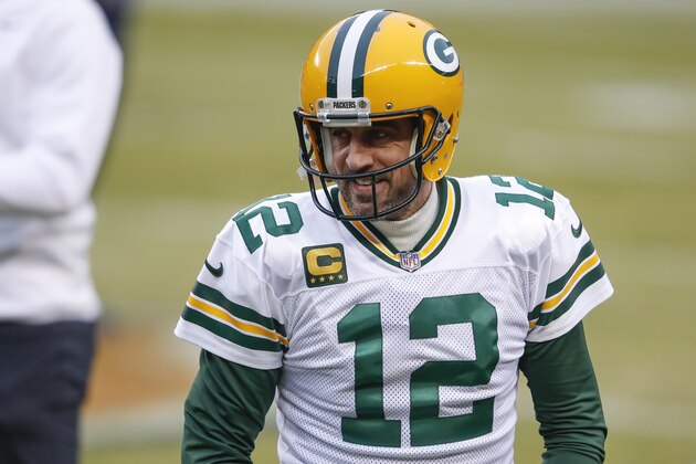 Green Bay Packers quarterback Aaron Rodgers (12) warms up before an NFL football game against the Chicago Bears, Sunday, Jan. 3, 2021, in Chicago. (AP Photo/Kamil Krzaczynski)
