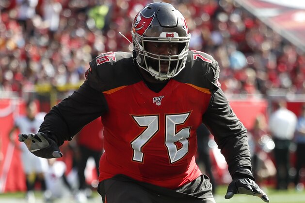 Tampa Bay Buccaneers offensive tackle Donovan Smith (76) sets to block against the Atlanta Falcons during an NFL football game Sunday, Dec. 29, 2019, in Tampa, Fla. The Falcons won the game 28-22 in overtime. (Jeff Haynes/AP Images for Panini)