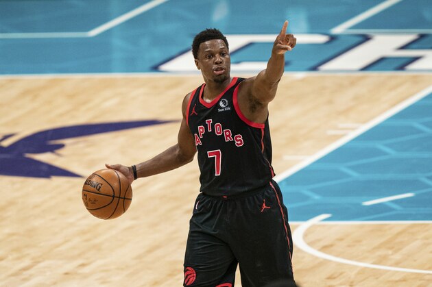 Toronto Raptors guard Kyle Lowry (7) directs a play against the Charlotte Hornets during the first half of an NBA basketball game in Charlotte, N.C., Saturday, March 13, 2021. (AP Photo/Jacob Kupferman)