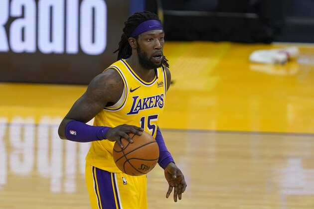 Los Angeles Lakers center Montrezl Harrell dribbles against the Golden State Warriors during the first half of an NBA basketball game in San Francisco, Monday, March 15, 2021. (AP Photo/Jeff Chiu)