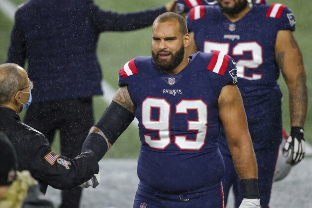 New England Patriots defensive lineman Lawrence Guy (93) prior to an NFL football game against the Baltimore Ravens, Sunday, Nov. 15, 2020, in Foxborough, Mass. (AP Photo/Stew Milne)