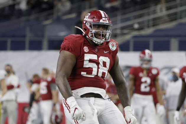 Alabama defensive lineman Christian Barmore (58) celebrates a sack against Notre Dame during the Rose Bowl NCAA college football game in Arlington, Texas, Friday, Jan. 1, 2021. (AP Photo/Michael Ainsworth)