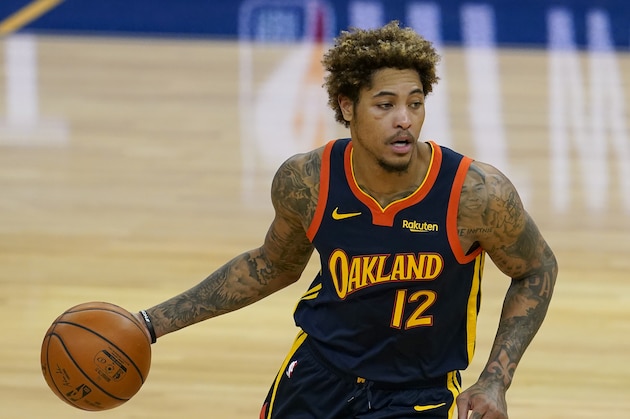 Golden State Warriors guard Kelly Oubre Jr. (12) against the Philadelphia 76ers during an NBA basketball game in San Francisco, Tuesday, March 23, 2021. (AP Photo/Jeff Chiu)