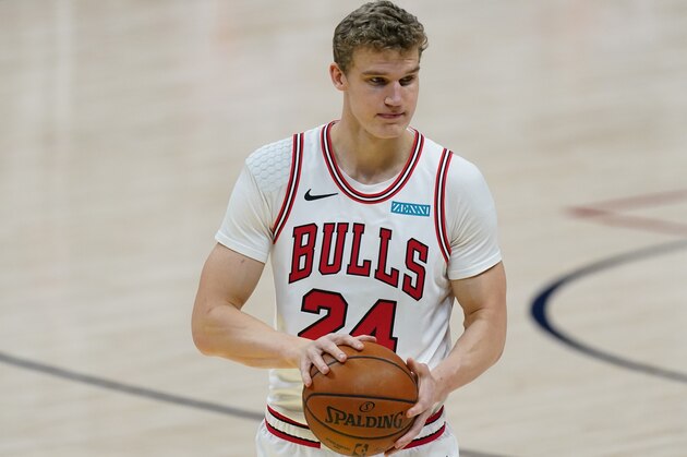 Chicago Bulls forward Lauri Markkanen (24) in the first half of an NBA basketball game Friday, March 19, 2021, in Denver. (AP Photo/David Zalubowski)