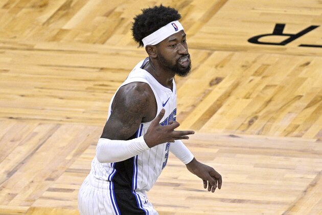Orlando Magic guard Terrence Ross celebrates after scoring a 3-point basket during the second half of the team's NBA basketball game against the New York Knicks, Wednesday, Feb. 17, 2021, in Orlando, Fla. (AP Photo/Phelan M. Ebenhack)
