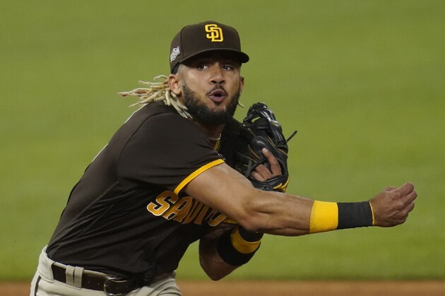 San Diego Padres shortstop Fernando Tatis Jr. (23) in Game 2 of a baseball National League Division Series against the Los Angeles Dodgers Wednesday, Oct. 7, 2020, in Arlington, Texas. (AP Photo/Sue Ogrocki) San Diego Padres shortstop Fernando Tatis Jr. (23) in Game 2 of a baseball National League Division Series against the Los Angeles Dodgers Wednesday, Oct. 7, 2020, in Arlington, Texas. (AP Photo/Sue Ogrocki)
