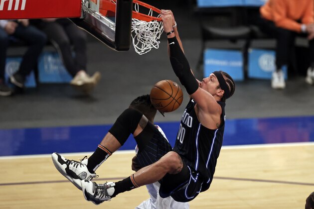 Orlando Magic forward Aaron Gordon dunks during the second half of the team's NBA basketball game against the New York Knicks on Thursday, March 18, 2021, in New York. (AP Photo/Adam Hunger, Pool)