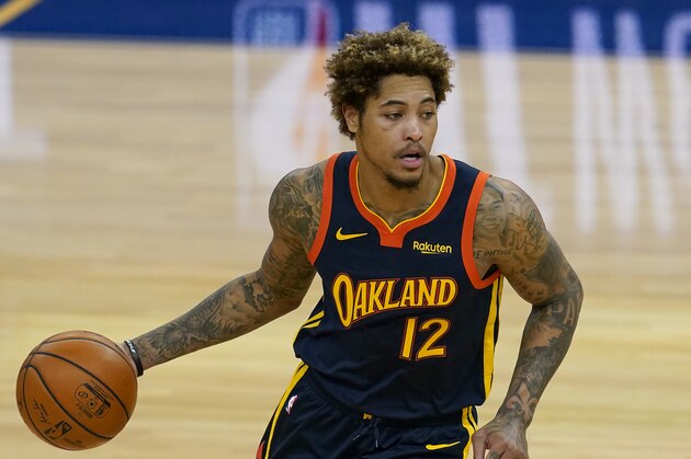 Golden State Warriors guard Kelly Oubre Jr. (12) against the Philadelphia 76ers during an NBA basketball game in San Francisco, Tuesday, March 23, 2021. (AP Photo/Jeff Chiu)
