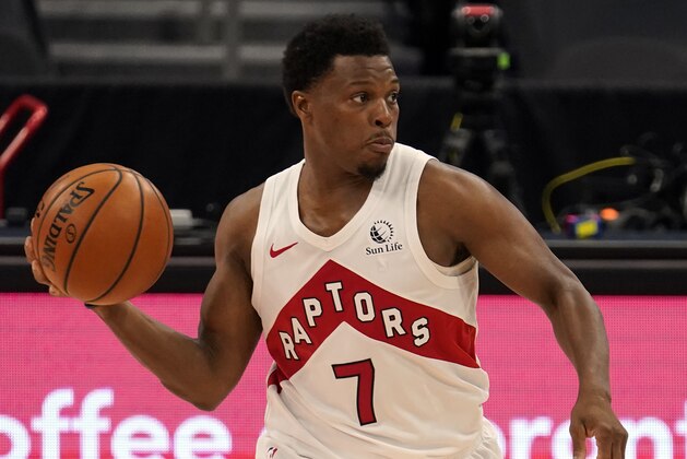 Toronto Raptors guard Kyle Lowry (7) moves the ball against the Denver Nuggets during the second half of an NBA basketball game Wednesday, March 24, 2021, in Tampa, Fla. (AP Photo/Chris O'Meara)