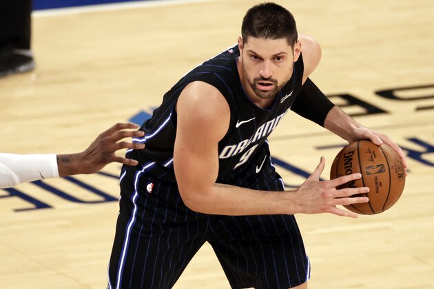 Orlando Magic center Nikola Vucevic (9) looks to pass against the New York Knicks during the second half of an NBA basketball game Thursday, March 18, 2021, in New York. (AP Photo/Adam Hunger, Pool)