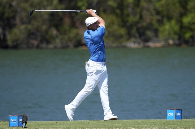 Bryson DeChambeau tees off the 14th holesduring a second round match at the Dell Technologies Match Play Championship golf tournament Thursday, March 25, 2021, in Austin, Texas. (AP Photo/David J. Phillip)